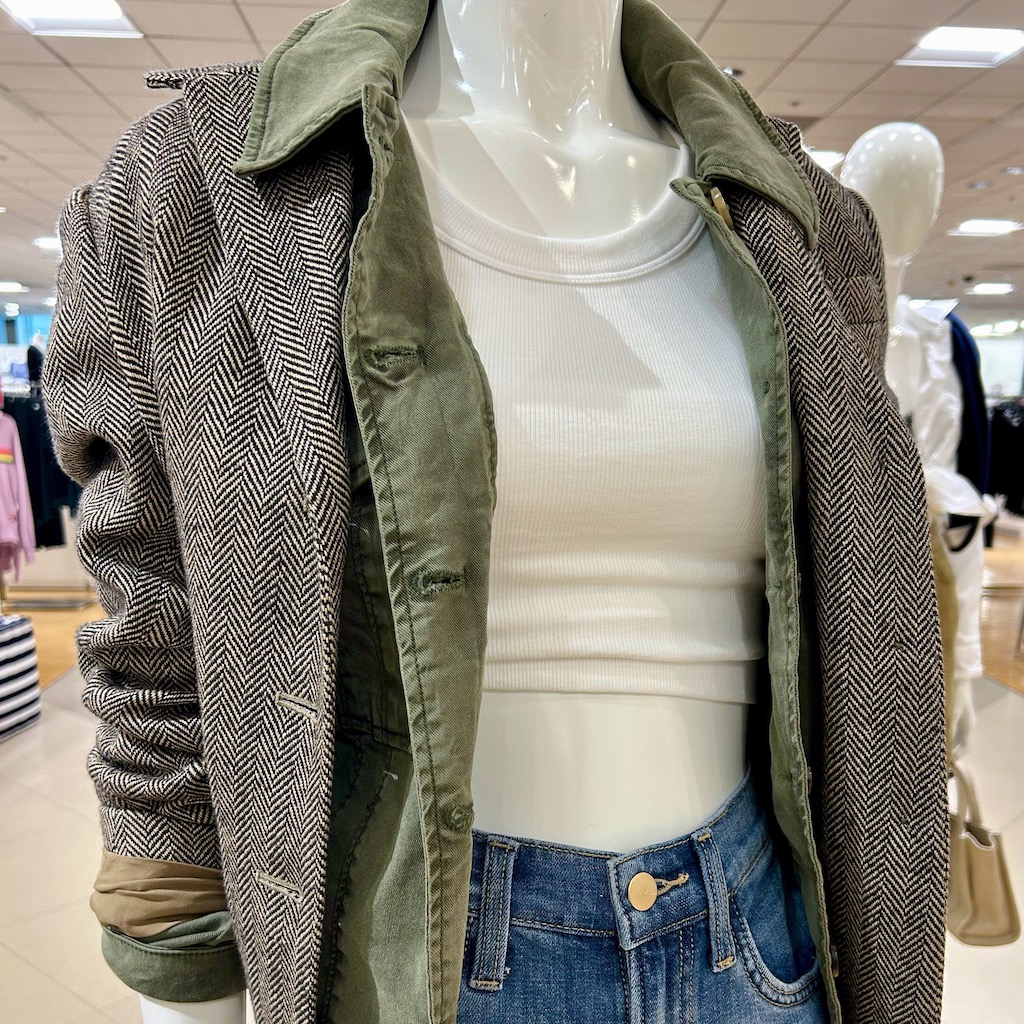 MODEL WEARING TWEED BLAZER LAYERED OVER WHITE TANK AND PAIRED WITH JEANS